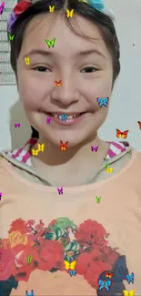 Smiling girl with colorful butterflies mobile wallpaper.