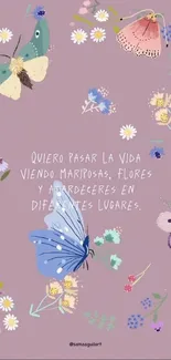 Mobile wallpaper with colorful butterflies and flowers with a Spanish quote.