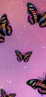 Colorful butterflies against a pink galaxy sky.