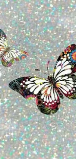 Colorful butterflies on a sparkling silver background.