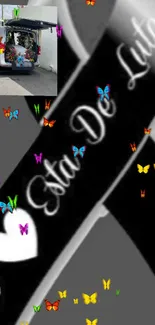 Colorful butterflies on black ribbon mobile wallpaper.