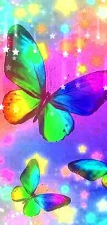 Colorful butterflies on a vibrant rainbow background.