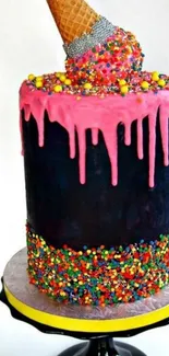 Colorful cake with sprinkles and ice cream cone topping.