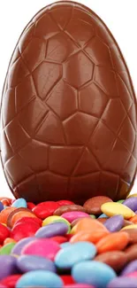 Chocolate Easter egg with colorful candies.