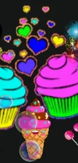 Colorful cupcakes and candies on a dark background wallpaper.