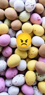 Colorful candy eggs wallpaper with a yellow emoji.