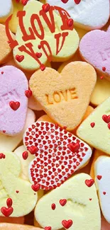 Colorful candy hearts with love messages in pastel colors.