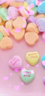 Pastel candy hearts on a pink plate, perfect for a playful mobile wallpaper.