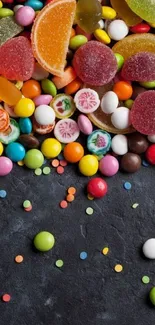 Vibrant candy scattered on a black background.