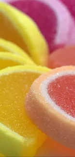 Close-up of colorful, sugar-coated candy slices in vibrant shades.