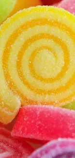 Vibrant colored candy spirals close-up in a bright mobile wallpaper.