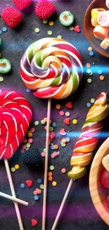 Colorful candy with lollipops and sweets on a dark background.