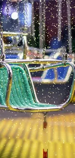 Vibrant carnival swing ride with sparkling lights, perfect for mobile wallpaper.