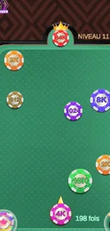 Colorful casino chips on green table with geometric background.