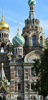 Colorful cathedral domes against a blue sky.