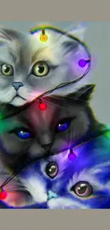 Three colorful cats wrapped in festive lights on a gray background.