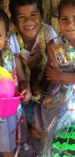 Three smiling children with colorful decorations in a joyful celebration scene.