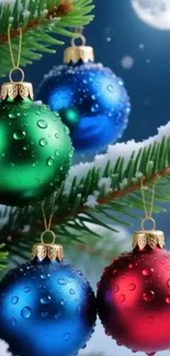 Colorful Christmas ornaments on snowy branches.