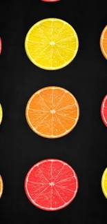 Colorful citrus slices on dark background wallpaper.