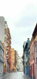 Mobile wallpaper of a colorful city street with vibrant buildings.