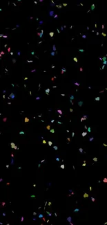 Colorful confetti on a black background mobile wallpaper.