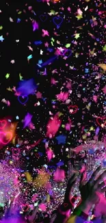 Vibrant confetti explosion at a lively celebration or concert.