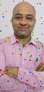 Mobile wallpaper with colorful confetti and a pink background.