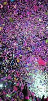 Dynamic explosion of colorful confetti on a mobile wallpaper background.