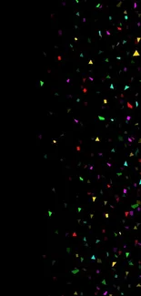 Colorful confetti wallpaper with black background for mobile.