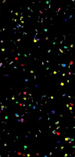 Vibrant confetti pattern on a black background.