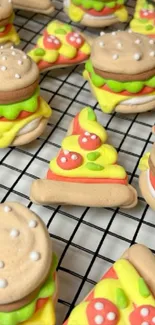 Colorful cookies shaped like burgers and pizza on a grid.