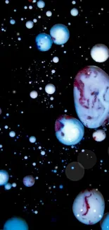 Colorful cosmic bubbles on a black background, creating a vibrant abstract design.