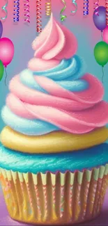 Colorful cupcake with balloons and festive decorations.