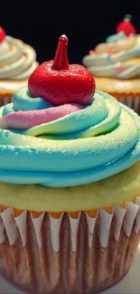 Vibrant cupcake with colorful frosting and cherry on top.