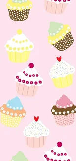 Colorful cupcakes pattern wallpaper on a light pink background.