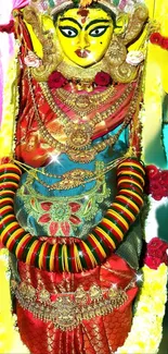 Colorful deity adorned in rich, traditional attire.