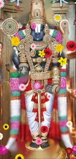 Colorful, adorned deity with flowers in a rich, vivid temple setting.