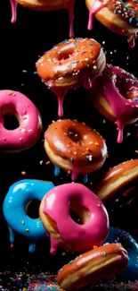 Colorful donuts with icing and sprinkles in a dynamic cascade.