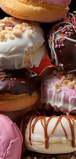 Stack of colorful glazed donuts with various toppings.