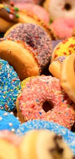 A vibrant collection of colorful donuts with sprinkles and toppings.