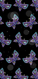 Mobile wallpaper with colorful dotted butterflies on a black background.