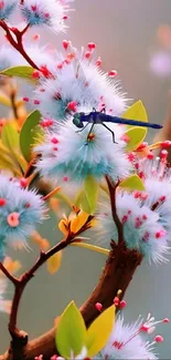 Dragonfly resting on pastel blue flowers, vibrant spring scene.