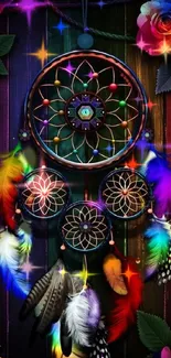 Vibrant dreamcatcher with colorful feathers and roses on a dark background.