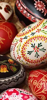 Vibrant Easter eggs with intricate artistic designs in a wicker basket.