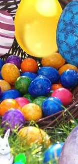 Basket of colorful Easter eggs with a rabbit in vibrant sunlight.