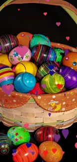 A basket of colorful decorated Easter eggs, perfect for festive wallpapers.