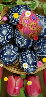 Mobile wallpaper with colorful Easter eggs in a basket with floral accents.