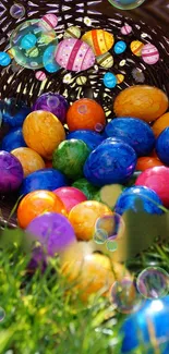 Colorful Easter eggs spilling from a basket onto grass.