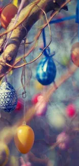 Colorful Easter eggs hanging from branches create a festive decoration.