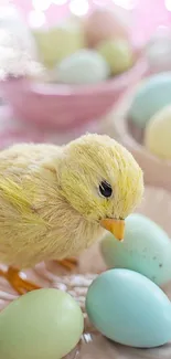 Fluffy chick with pastel Easter eggs on a delicate plate.